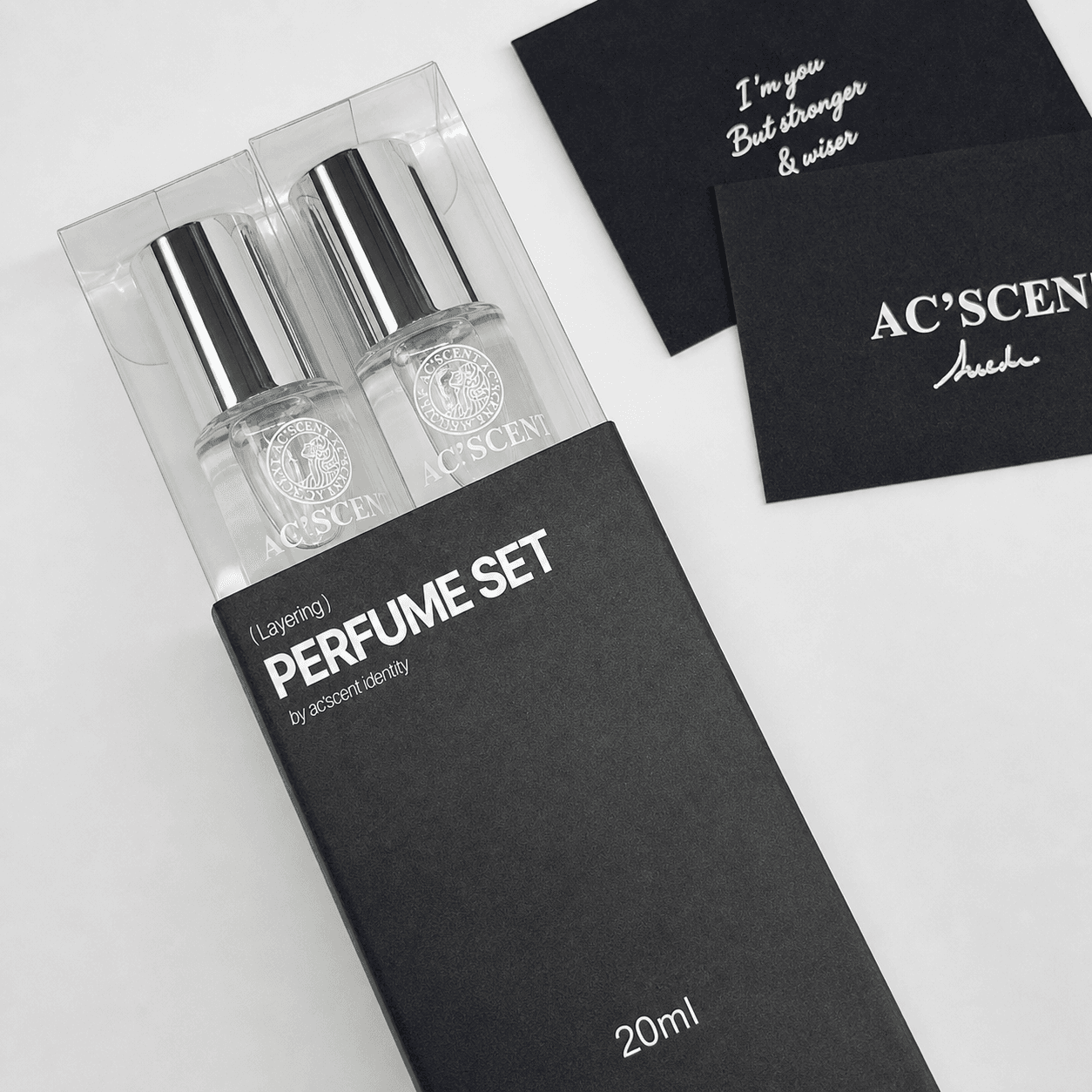 제품 이미지 — 실제 10ml 퍼퓸 두 병이 투명 인서트에 고정되는 20ml 세트 구성입니다.